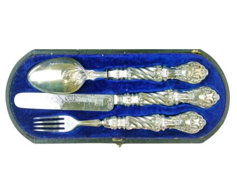 Victorian silver three piece christening set comprising: knife, fork and spoon, each having a decorative embossed handle, mak