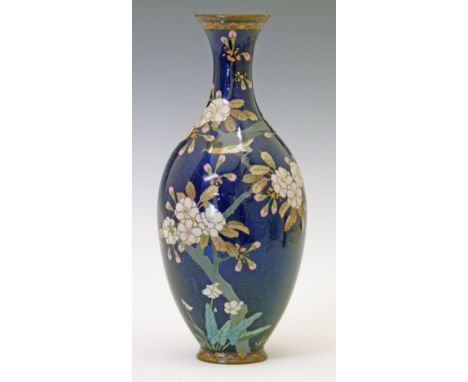 Japanese cloisonnÚ ovoid vase decorated with birds amongst foliage on a blue sparkle ground, 30cm high  Condition: Star crack