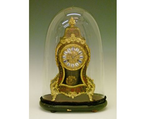 19th Century French ormolu mounted buhl and red tortoiseshell cased mantel clock, the dial with blue and white enamel Roman n