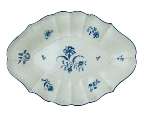 18th Century Worcester blue and white printed oval dish decorated with the Gillifilower pattern within a basket weave border,