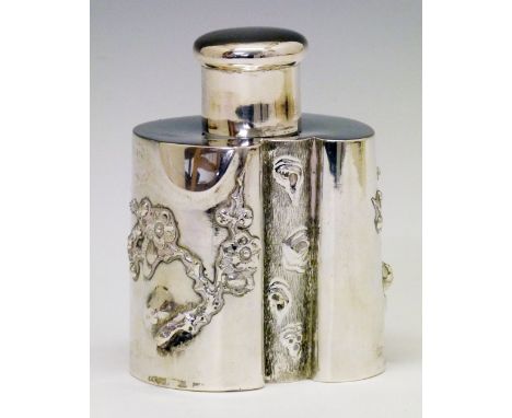 Chinese white metal kidney shaped tea caddy and cover having prunus decoration in relief, maker Hung Chong of Canton and Shan