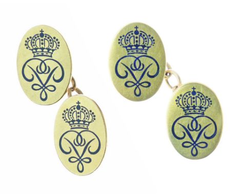 Royal Interest - Pair of cufflinks, the oval panels stamped '18ct', enamelled in blue with crossing letter 'P's with a crown 