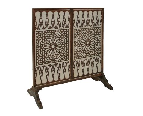 19th Century Indian hardwood and ivory double sided games board, now framed as a firescreen, 57.5cm wide  Condition: The side