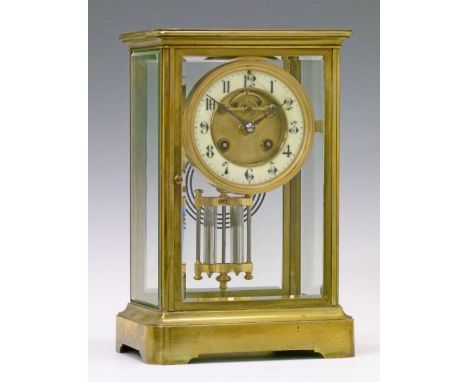 Late 19th/early 20th Century French brass cased four glass mantel clock, the brass dial having enamelled chapter ring with Ar