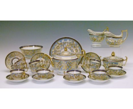 19th Century English porcelain London shape tea service, circa 1825, probably Spode, having gilt foliate decoration on a coba