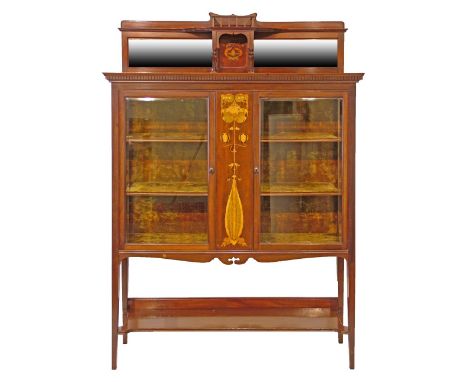 Art Nouveau mahogany display cabinet, circa 1900, having stylised foliate inlaid decoration, the raised back with two bevelle