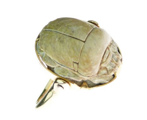 Scarab ring, the swivelling faience beetle with pseudo-hieroglyphics to the reverse, the yellow mount with indistinct marks, 