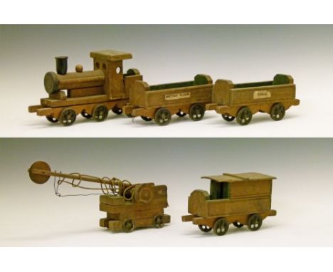 Vintage wooden toy train comprising: locomotive and tender, two coal wagons and a crane, bears label with script 'All British