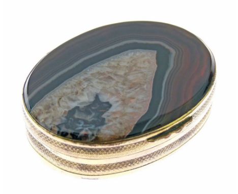 19th Century gilt brass framed oval snuff box, the hinged cover and the base inset with a veined agate panel, 6cm wide  Condi