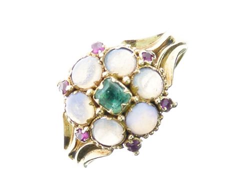 Victorian opal, ruby and emerald ring; the six round cabochon opals with an emerald to the centre and six ruby points, size L