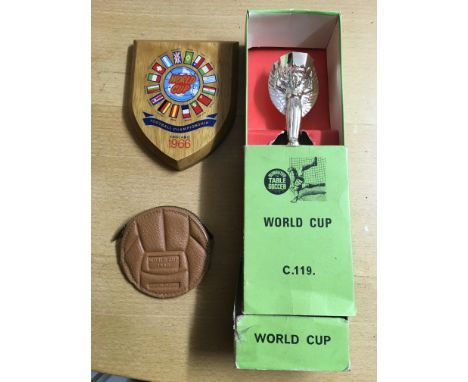 1966 World Cup Football Memorabilia: Includes a rare small purse in the format of a football with World Cup 1966 embossed. Al