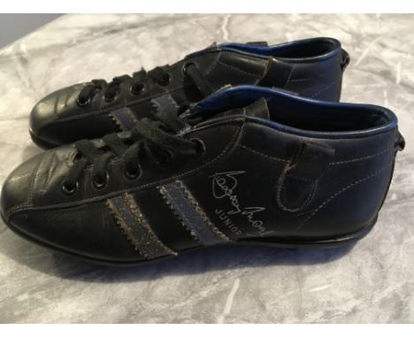 Bobby Moore West Ham + England Football Boots: Incredibly rare Bobby Moore Junior football boots. Bobby Moores autograph is p