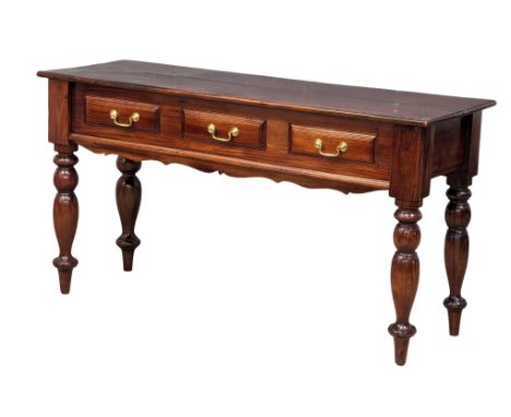 A large mahogany console table with 3 drawers and turned legs. 140x49x75cm 