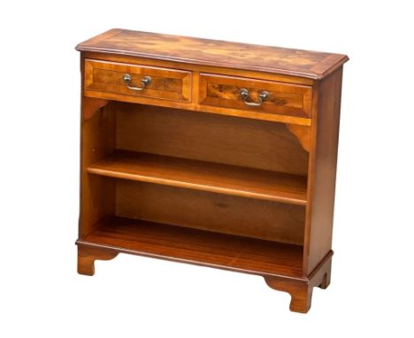 An inlaid yew wood open bookcase with 2 drawers. 77x29.5x73cm 