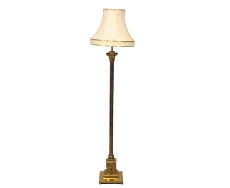 A tall brass standard lamp with Corinthian pillar. 163cm 
