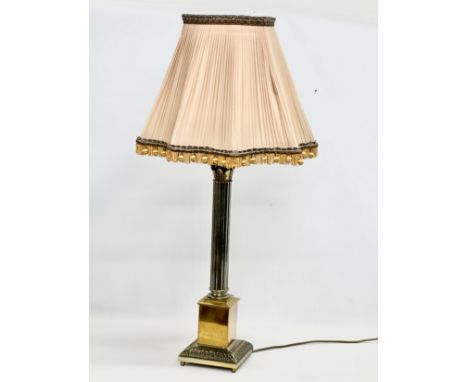 A large vintage brass table lamp with Corinthian style column. Base measures 17x17x74cm. 