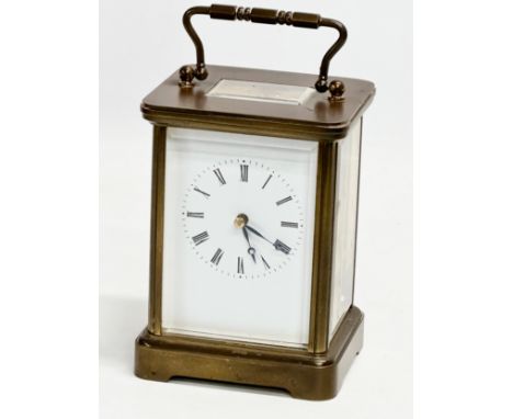 A large early 20th Century Matthew Norman brass carriage clock. 10x8.5x14cm 
