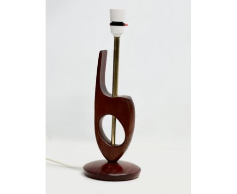 A 1960’s Mid Century stained teak table lamp. 38cm 