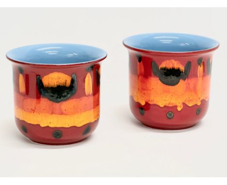 A pair of Poole Pottery ‘Flambé Volcano’ jardiniere/planters. 17.5x15cm 