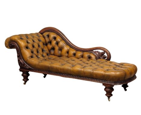 A good quality Early Victorian mahogany framed deep button leather chaise lounge. 204cm 