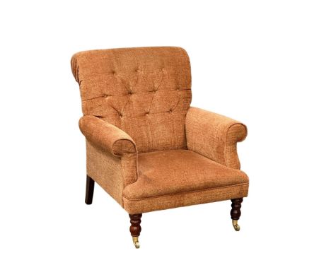 A Late Victorian style button back armchair on brass cup casters. 82x86x91cm 