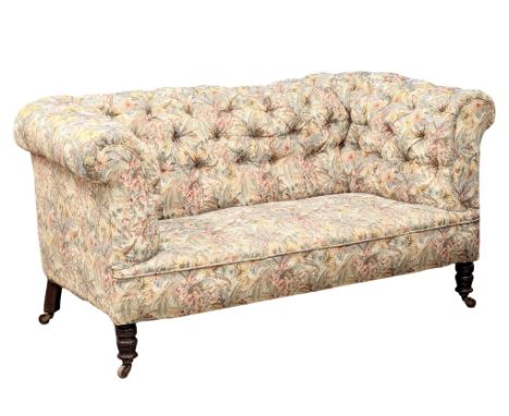 A Late 19th Century Victorian deep button back 2 seater sofa on turned legs. Circa 1880. 164.5cm 