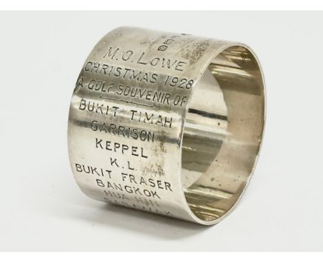 A silver napkin ring. Christmas 1928. A Gold Souvenir of Bukit Timah, Garrison, Keppel, K.L, Bukit Fraser, Bangkok, Hua Hin, 