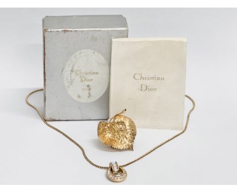 Christian Dior necklace and brooch with box. 