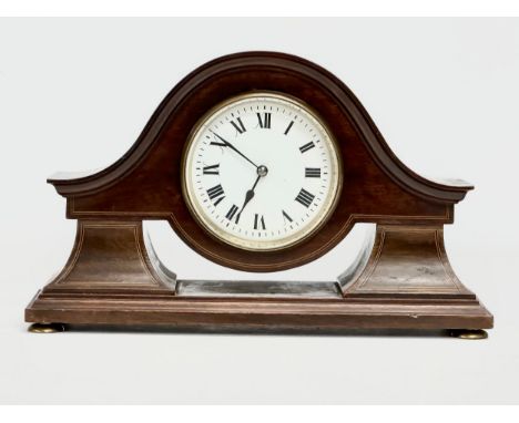 An Edwardian inlaid mahogany mantle clock. 28x9x17cm 