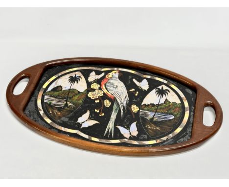 A Mid 20th Century Brazilian serving tray with Mother of Pearl parrot and butterfly design. 70x41cm 