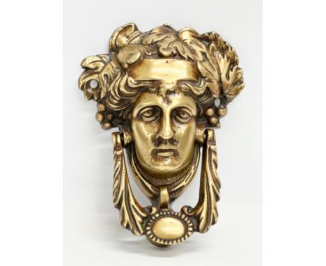 A Late 19th Century Victorian brass ‘Dionysus’ door knocker. 18cm 