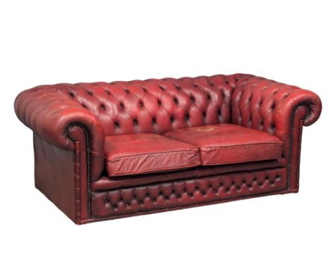 A 2 seater Chesterfield style button back sofa, 169cm 