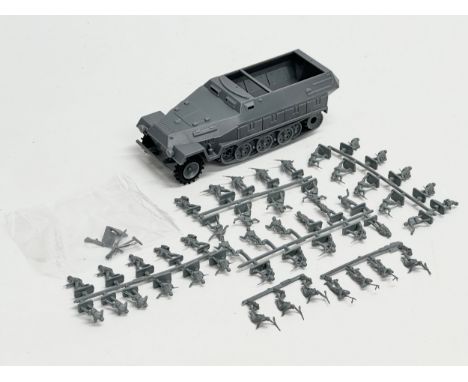 A collection of vintage Airfix WWII German soldiers. HO-OO scale. Including a WWII German Hanomag. 