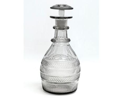An Early 19th Century Irish George III double ring decanter. Circa 1800. 25cm 
