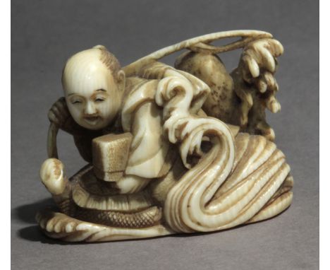 A Japanese netsuke from Meiji period circa 1860-1880. Signed on the base. In carved elephant tusk portraying a fisherman sail