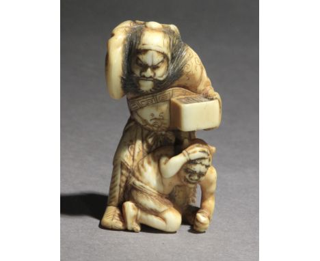 A mid 19th century Japanese netsuke from Edo period. Signed Tomochika on the base. In carved elephant tusk portraying a stand