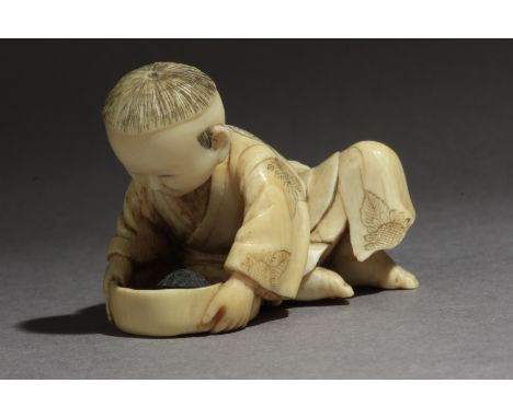 A Japanese netsuke from Meiji period circa 1850-1880. Signed Masatsugu on a red kanji on the base. In carved elephant tusk po