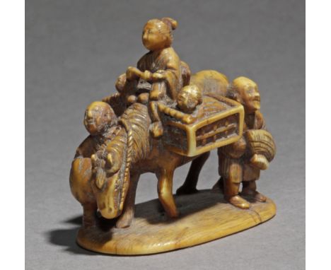 A Japanese netsuke from Meiji period circa 1860-1880. Signed Chousai and with a seal on the base. In carved elephant ivory po