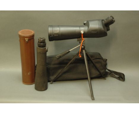 Two spotting scopes, Optus 20-60 with tripod and case and Supra Varibel 25-50, made in Germany, with case. 