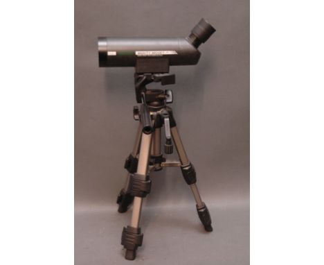 An Opticron Might Midget spotting scope, 20 x 50, with a Vanguard VS90 tripod.  