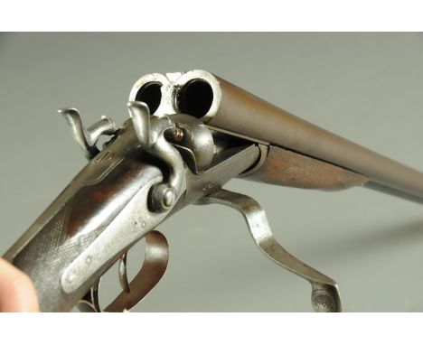 A Richardson of Cork double barrel 8 bore shotgun, 29.5" Damascus barrels, the rib engraved T. Richardson & Sons, Patrick Str