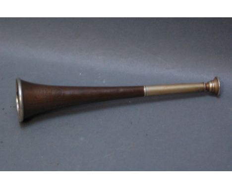 An Army & Navy CSL copper hunting horn, engraved "Army & Navy CSL, 105 Victoria Street, London, SW".  Length 24.5 cm, 5 cm be