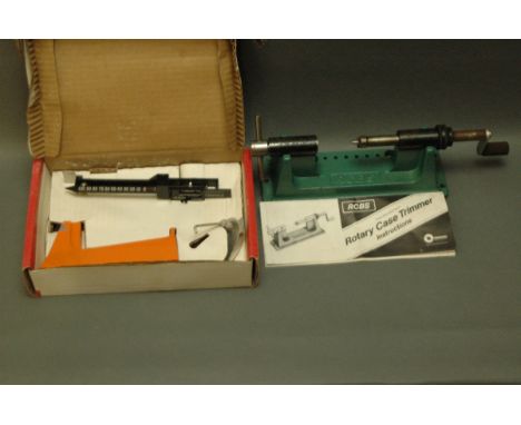 An RCBS rotary case trimmer and a Lee safety powder scale. 