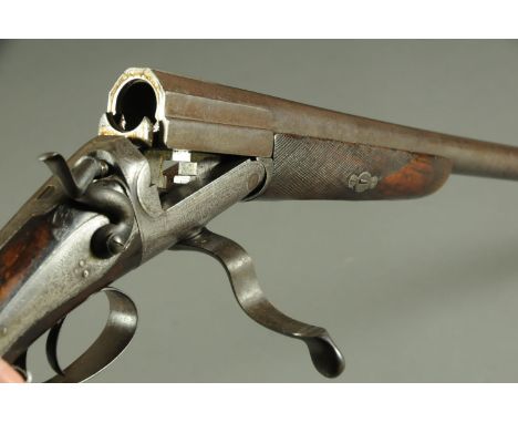 An E. Cox 8 bore single barrel hammer gun, 36" Damascus barrel, 3.2" chambers, nitro proof, rotary underlever, action with sc