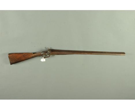 An English 13 bore pin fire shotgun, 30" steel barrels, hammers and locks with acanthus scroll, rotary underlever, double tri