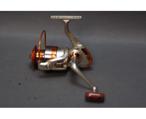 A Yumoshi fixed spool reel Model 4F4000.