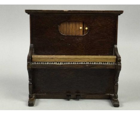 VINTAGE MUSIC BOX,modelled as a piano, along with other vintage items including a set of scales, a scientific ruler, an icing