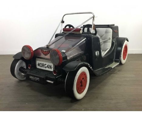 MORGAN AUTOMOBILE FAIRGROUND RIDE,circa 1980s, with translucent bonnet displaying the engine, 160cm long