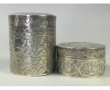 TWO MALAYA WHITE METAL LIDDED JARS,together with a paper knife and a boxed silver brush and comb set