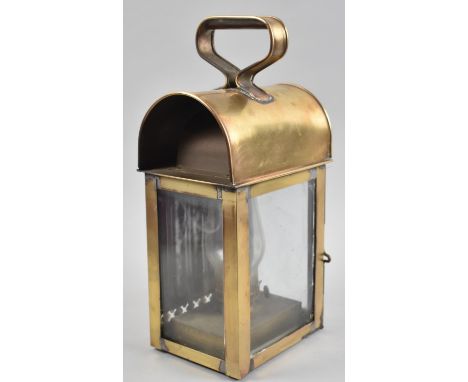 A Late 19th/Early 20th Century Brass Lamp with Domed Top and Looped Carrying Handle, 33cm high 